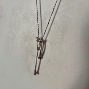 “Voodoo Child” necklace by Verameat in sterling silver.